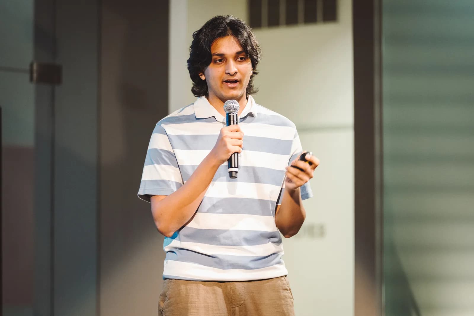 A Launchpad founder presenting with a microphone
